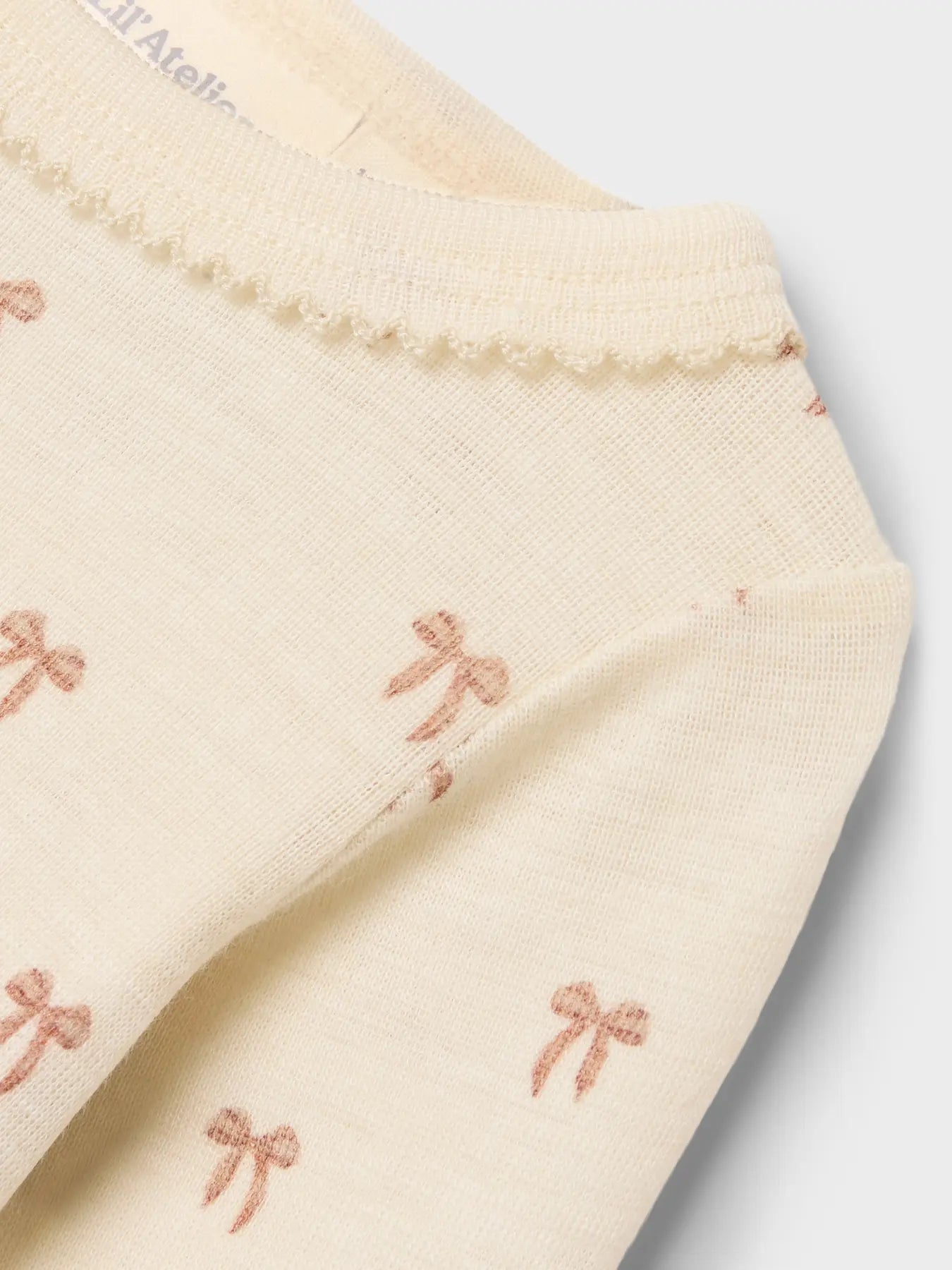 Lil Atelier | Romper Nalu wol strikjes