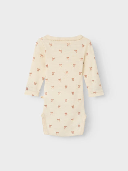 Lil Atelier | Romper Nalu wol strikjes