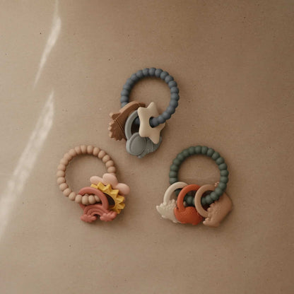 Mushie | Bijtring regenboog nude