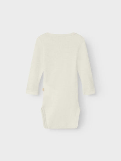 Lil Atelier | Romper wol Nalu durtledove